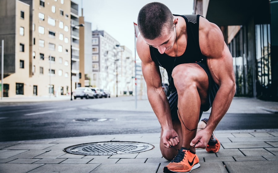 Runner tying laces on a city street