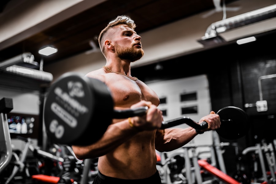 Apex Training Tank worn mid-lift in a dark gym