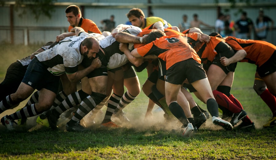 Rugby scrum at sunset
